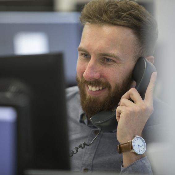 Staff member on phone